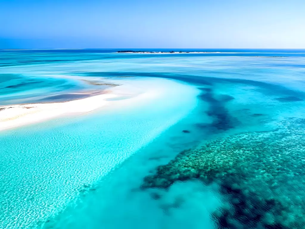 Endless turquoise waters and white sandbars of Africa's untouched paradise, a haven for serene beach retreats and luxury adventures.