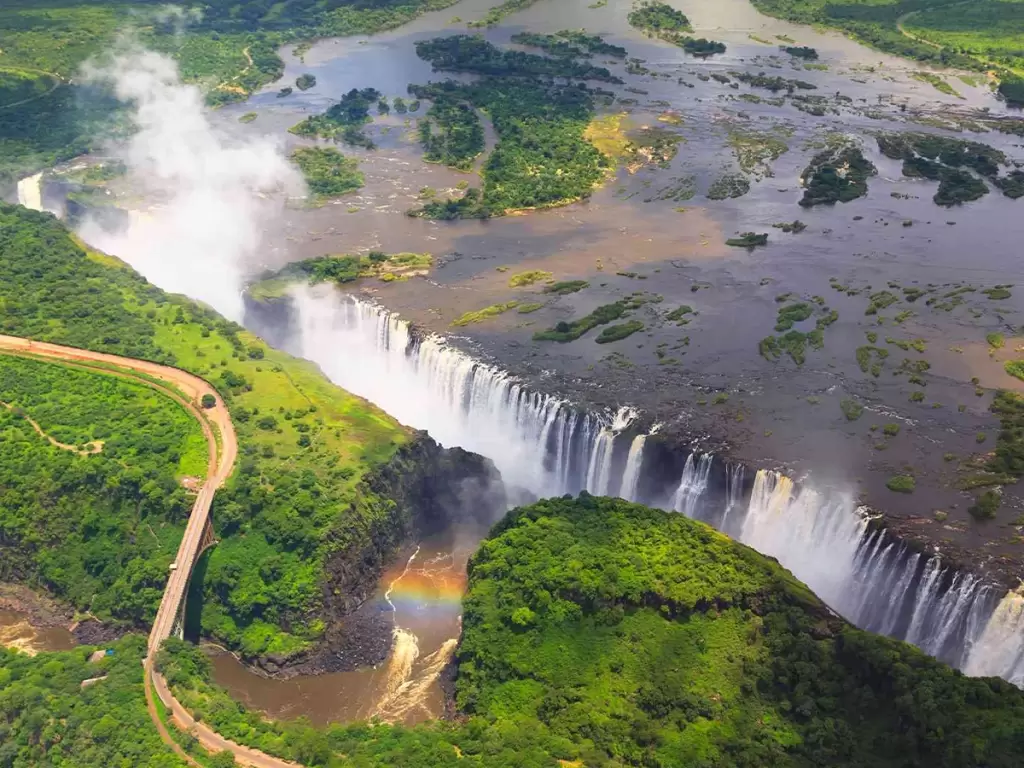 A helicopter ride on Zimbabwe’s Victoria Falls during a luxury family trip in Africa 2025 – 2026.