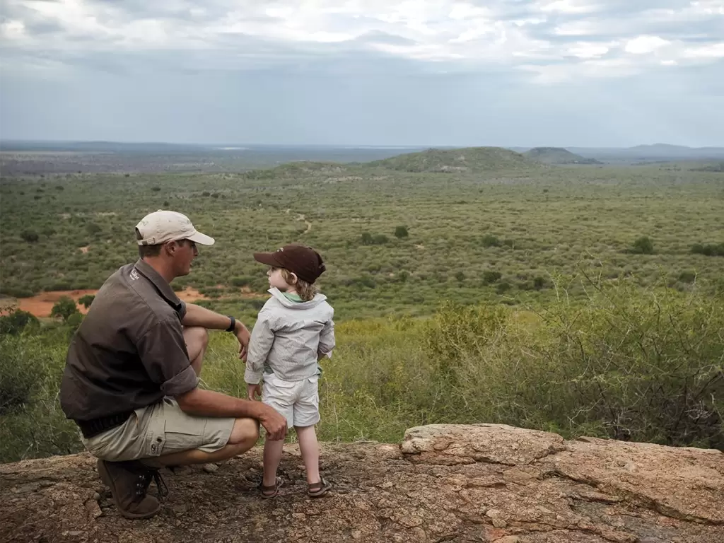 Parent-child bonding on an African safari with children.