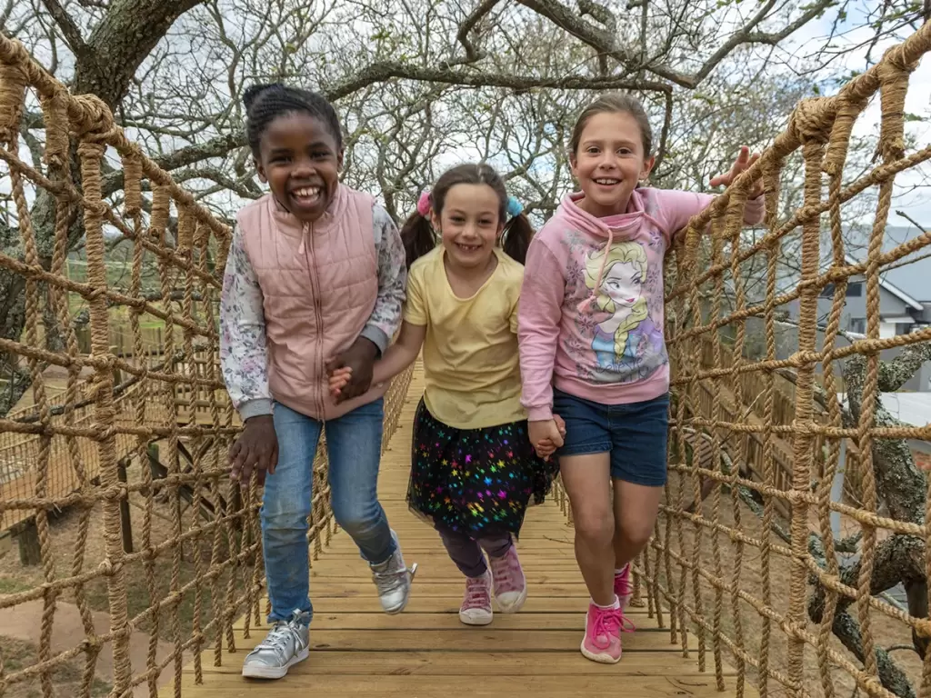 Children in an African safari enjoying safe and engaging activities available for kids on safari holidays.